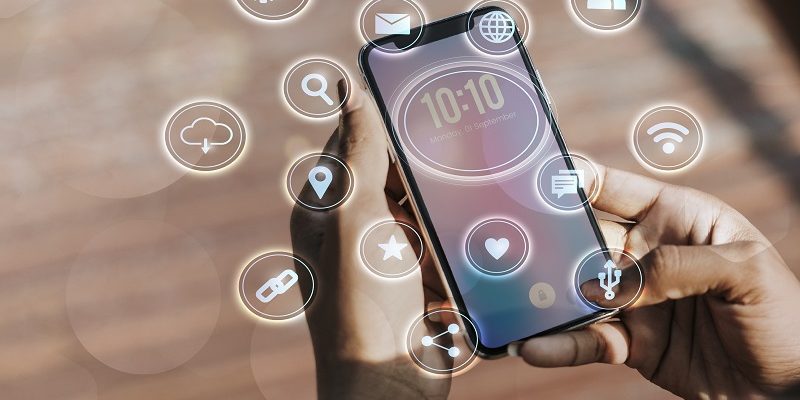 Athletic woman using her smartphone